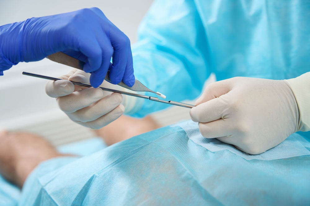 
          
            inserting a testosterone pellet 
          
        