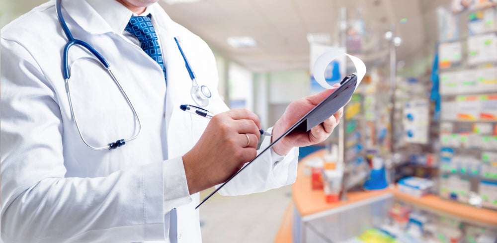 
          
            A doctor holding a clipboard, goes over his inventory of medical supplies, single-use vs reusable medical devices | disposable medical supplies 
          
        