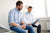 
          
            young male patient and his doctor discussing Testosterone Pellets vs Injections
          
        